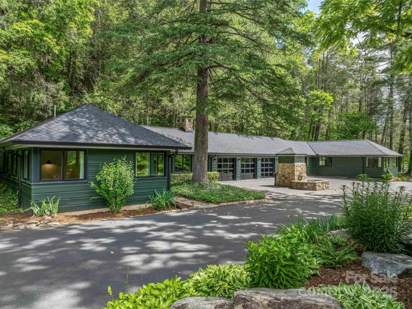 400 Kings Drive, Lake Lure, NC 28746.  MLS# CAR4264882, YatesRealty ID 2612. Old horse watering trough was equipped at one time with its own gas station. 