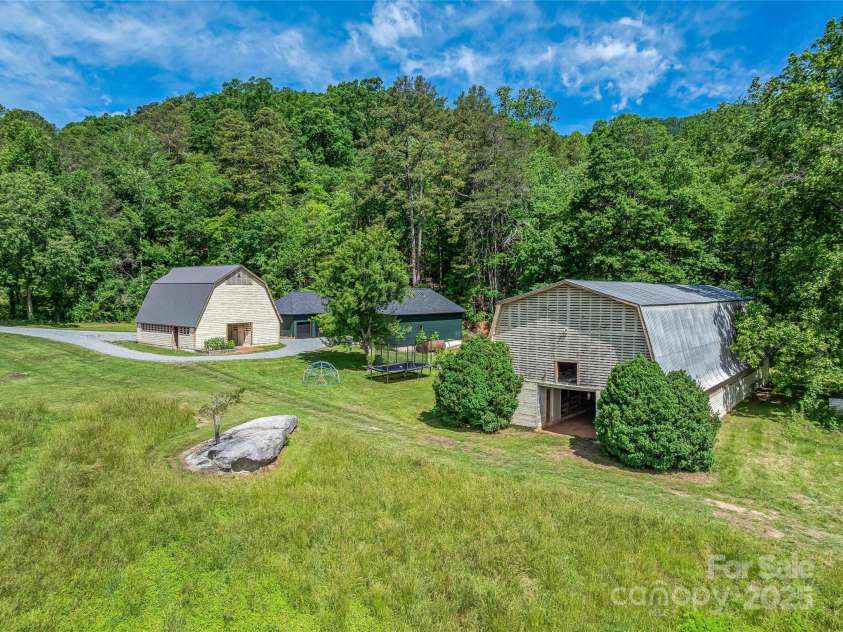 400 Kings Drive, Lake Lure, NC 28746.  MLS# CAR4264882, YatesRealty ID 2612. Over 10,000 square feet of Barn and Garage space in great condition and with new roofs.