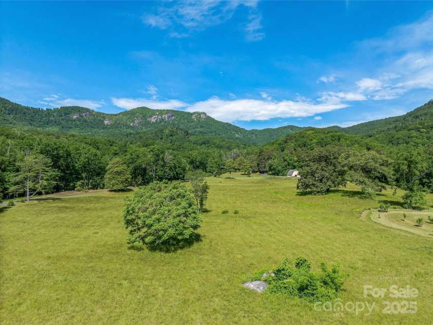 400 Kings Drive, Lake Lure, NC 28746.  MLS# CAR4264882, YatesRealty ID 2612. Over 30 acres of level unrestricted South East facing pasture with views looking up to the Bald Mountain Range and Eagle Rock Lookout in the distance