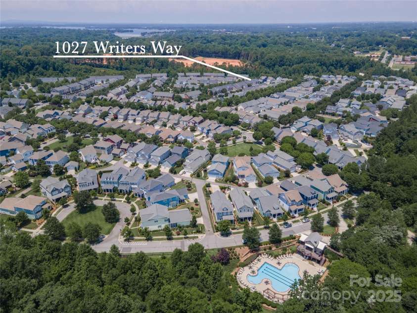 1027 Writers Way, Cornelius, NC 28031.  MLS# CAR4275170, YatesRealty ID 26124. Walk to the Cain Art Center in Downtown Cornelius.