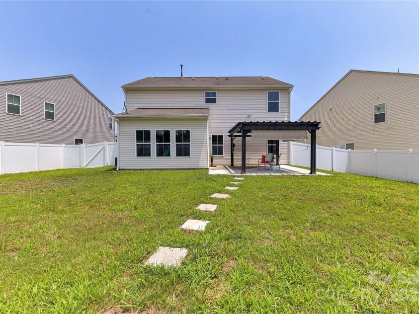 3533 Catherine Creek Place, Davidson, NC 28036.  MLS# CAR4279633, YatesRealty ID 26125. Exterior Back of home with covered, expansive patio perfect for relaxing!