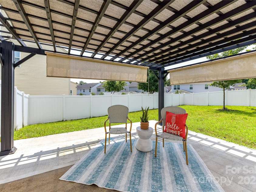 3533 Catherine Creek Place, Davidson, NC 28036.  MLS# CAR4279633, YatesRealty ID 26125. Oversized, Covered pergola/patio! (Pergola to convey)