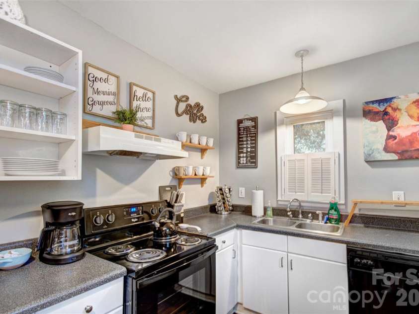1717 Hamorton Place, Charlotte, NC 28205.  MLS# CAR4381920, YatesRealty ID 26127. Kitchen on the upper level.