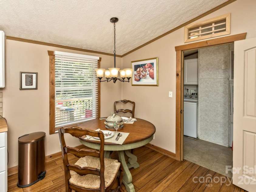 20 Howell Road, Brevard, NC 28712.  MLS# CAR4255039, YatesRealty ID 26130. Breakfast Area Just Off of the Mudroom