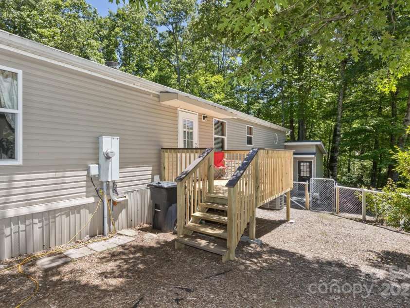 20 Howell Road, Brevard, NC 28712.  MLS# CAR4255039, YatesRealty ID 26130. Fenced in Backyard for your Pets