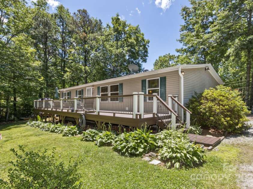 20 Howell Road, Brevard, NC 28712.  MLS# CAR4255039, YatesRealty ID 26130. Recently Stained and Upgraded Front Deck