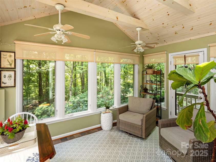64 Wells Lane, Tryon, NC 28782.  MLS# CAR4277197, YatesRealty ID 26131. Sun Porch off the Dining Room