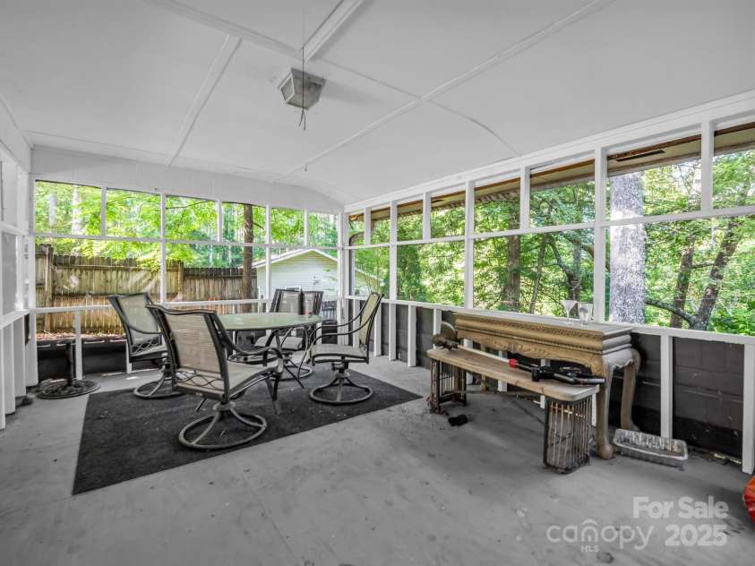 62 Kinard Lane, Penrose, NC 28766.  MLS# CAR4271193, YatesRealty ID 26132. Screened in porch