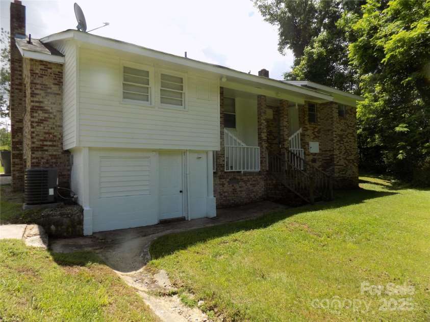209 Barber Road, Gastonia, NC 28056.  MLS# CAR4259358, YatesRealty ID 26134. Rear