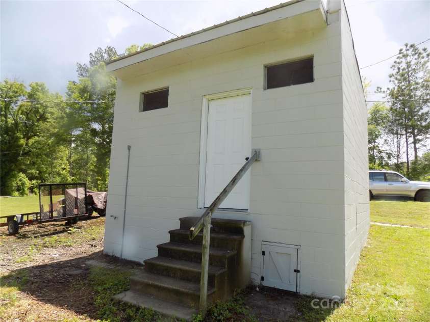 209 Barber Road, Gastonia, NC 28056.  MLS# CAR4259358, YatesRealty ID 26134. Rear Utility Building