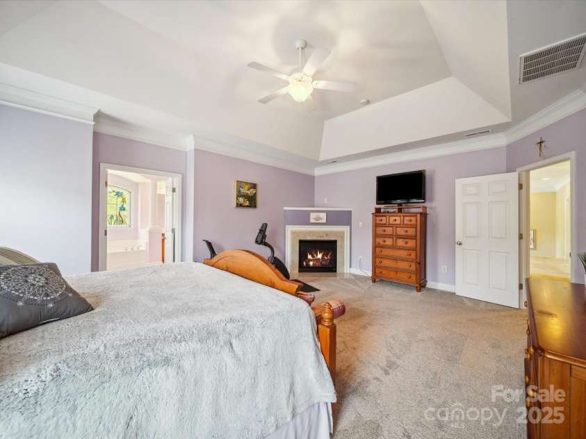 6523 Alba Rose Lane, Huntersville, NC 28078.  MLS# CAR4270008, YatesRealty ID 26142. Primary Bedroom with Fireplace