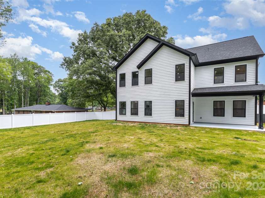 9527 Walkers Ferry Road, Charlotte, NC 28214.  MLS# CAR4255253, YatesRealty ID 26145. Covered back porch gives you space to enjoy your outdoor haven