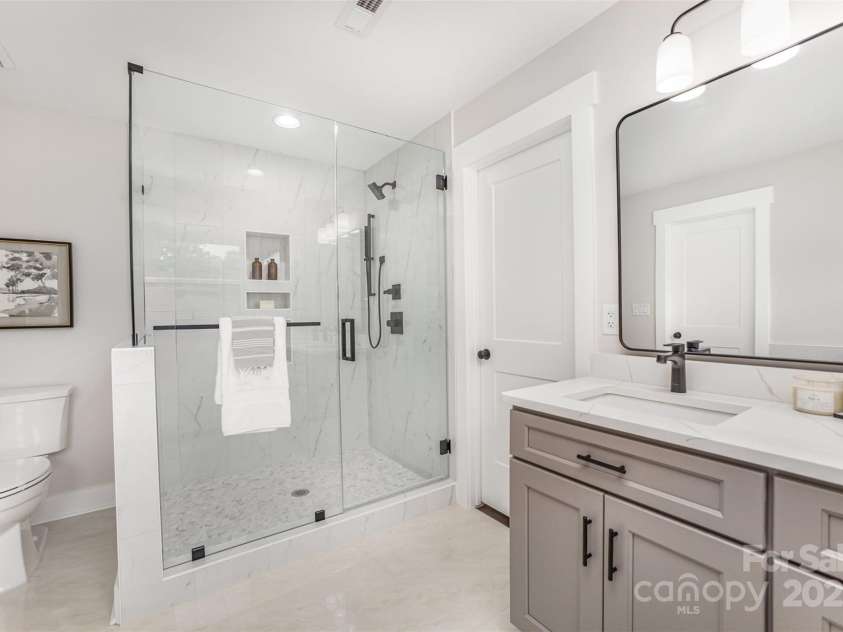 9527 Walkers Ferry Road, Charlotte, NC 28214.  MLS# CAR4255253, YatesRealty ID 26145. Elevated ensuite with with oversized shower