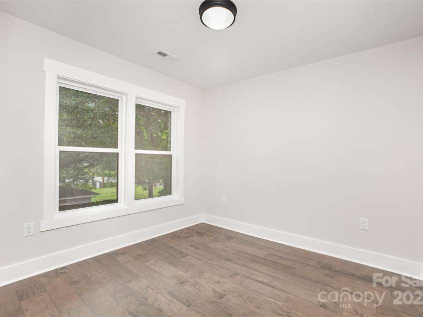 9527 Walkers Ferry Road, Charlotte, NC 28214.  MLS# CAR4255253, YatesRealty ID 26145. One of two secondary upstairs bedrooms