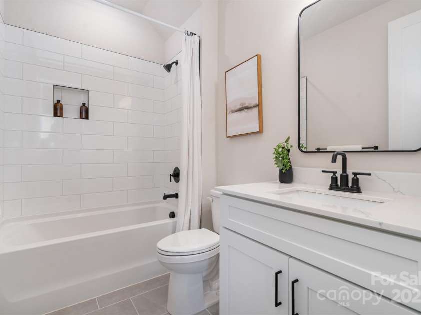 204 Mattoon Street, Charlotte, NC 28216.  MLS# CAR4249486, YatesRealty ID 26146. Representational Staged Photo from 208 Mattoon