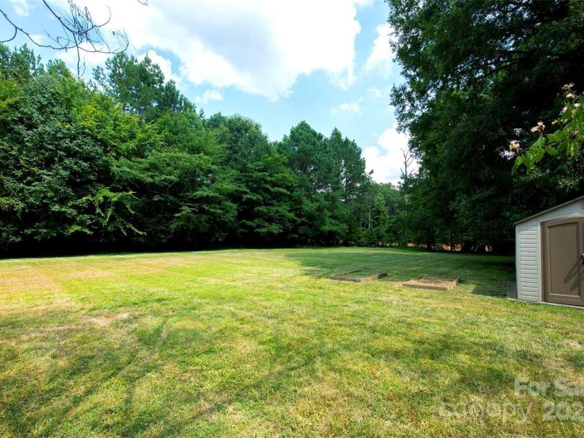 3933 Planters Place, Indian Trail, NC 28079.  MLS# CAR4254001, YatesRealty ID 26148. Back Yard