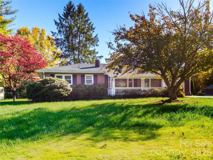 203 Oak Grove Road, East Flat Rock, NC 28726.  MLS# CAR4315485, YatesRealty ID 2615. 