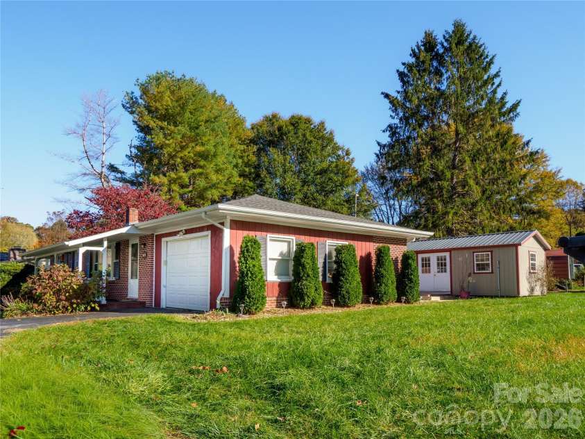 203 Oak Grove Road, East Flat Rock, NC 28726.  MLS# CAR4315485, YatesRealty ID 2615. 