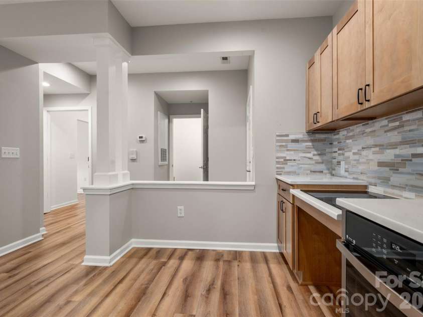 6112 Creft Circle, Indian Trail, NC 28079.  MLS# CAR4416294, YatesRealty ID 26151. Breakfast area with secondary bathroom & laundry room beyond