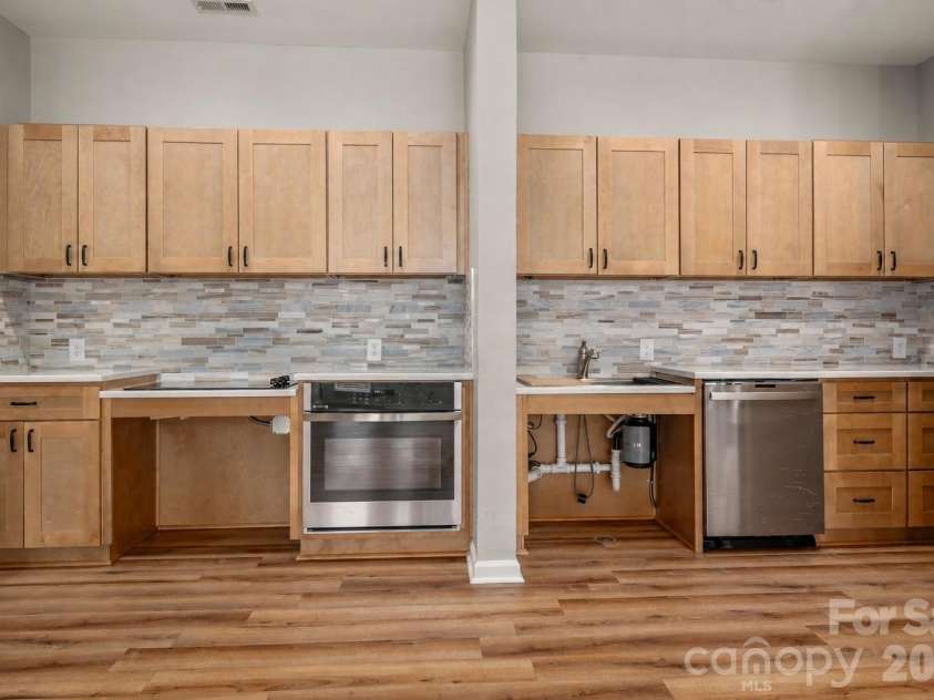 6112 Creft Circle, Indian Trail, NC 28079.  MLS# CAR4416294, YatesRealty ID 26151. Kitchen (Stovetop and Sink adapted for accessibility)