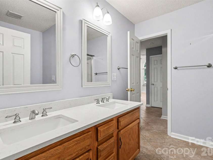 8929 Scotch Heather Way, Charlotte, NC 28277.  MLS# CAR4386663, YatesRealty ID 26153. Primary bathroom- dual sinks