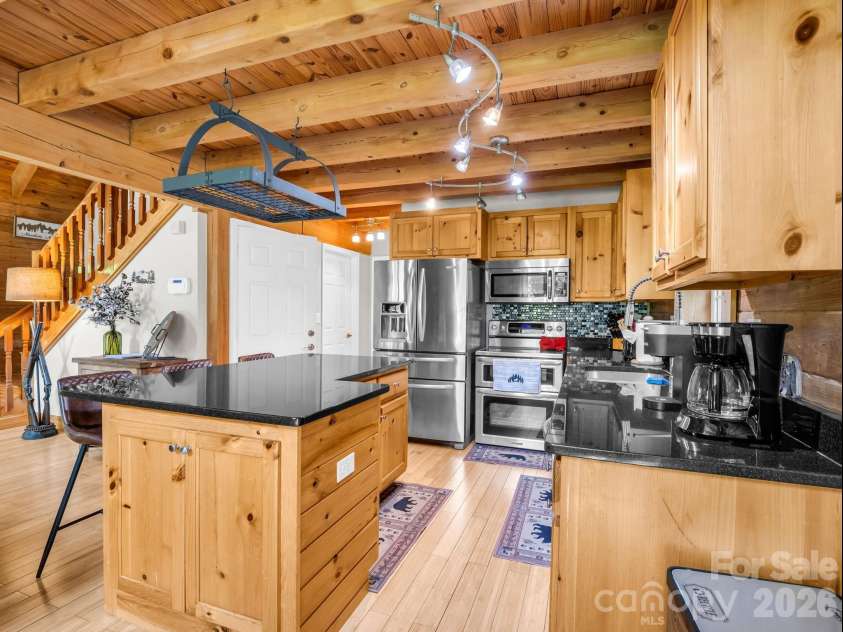 165 Dream Road, Hendersonville, NC 28792.  MLS# CAR4383909, YatesRealty ID 26155. Kitchen has plenty of storage.