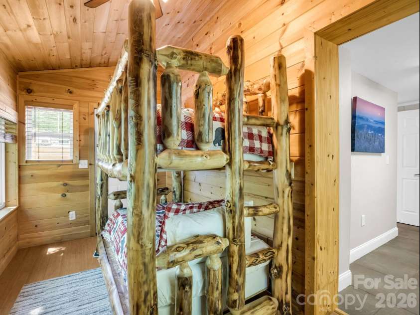 165 Dream Road, Hendersonville, NC 28792.  MLS# CAR4383909, YatesRealty ID 26155. This extra space has access to the main level back deck.