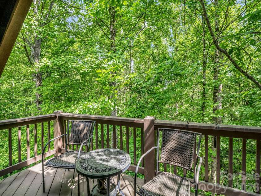 165 Dream Road, Hendersonville, NC 28792.  MLS# CAR4383909, YatesRealty ID 26155. Upper deck off the loft bedroom.