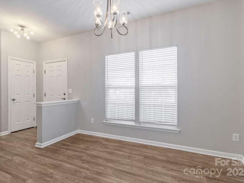 12207 Jessica Place, Charlotte, NC 28269.  MLS# CAR4235868, YatesRealty ID 26157. Looking back at entry door and dining area
