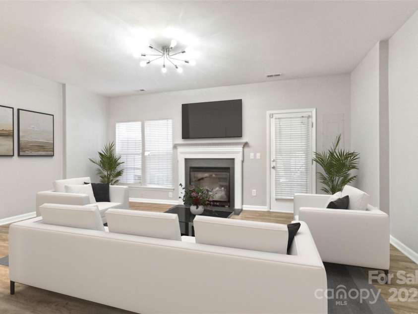 12207 Jessica Place, Charlotte, NC 28269.  MLS# CAR4235868, YatesRealty ID 26157. Virtual Staged Living area