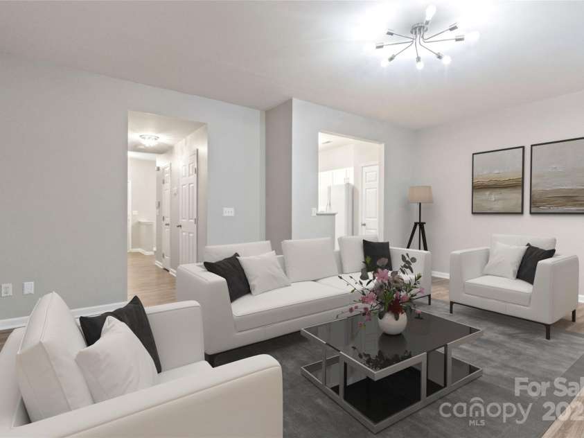 12207 Jessica Place, Charlotte, NC 28269.  MLS# CAR4235868, YatesRealty ID 26157. Virtual Staged Living area