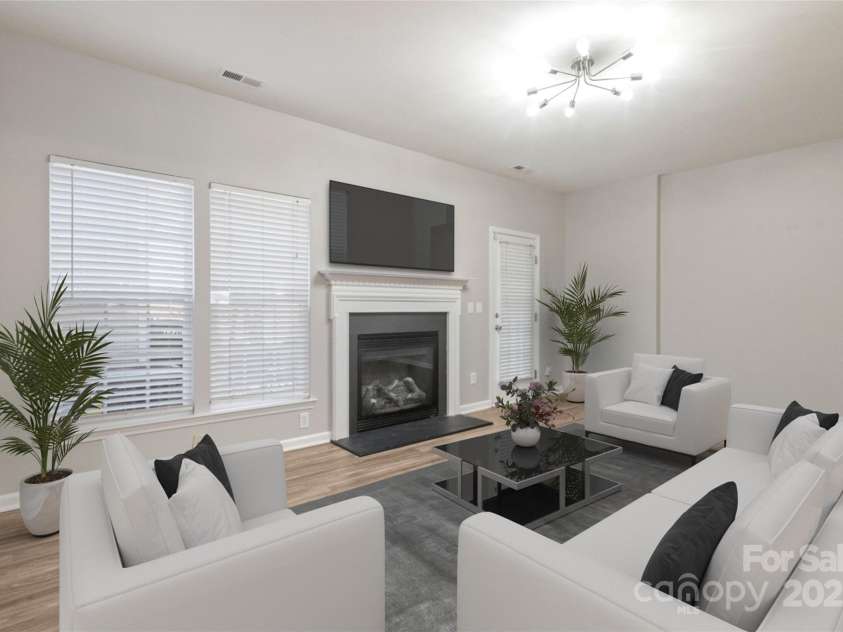 12207 Jessica Place, Charlotte, NC 28269.  MLS# CAR4235868, YatesRealty ID 26157. Virtual Staged Living area
