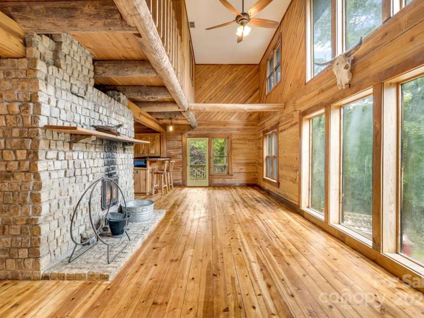 465 Youngs Gap Road, Fletcher, NC 28732.  MLS# CAR4275186, YatesRealty ID 26162. Great room