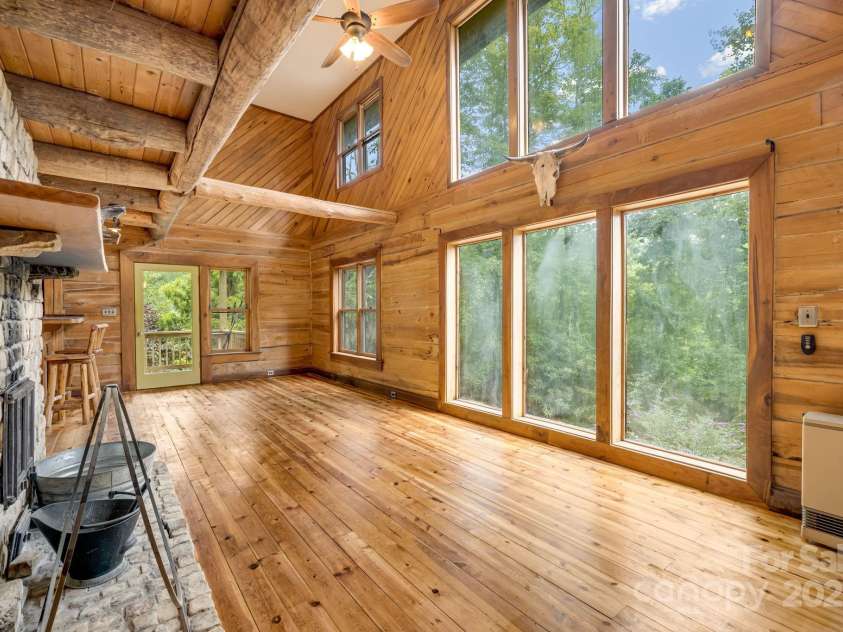 465 Youngs Gap Road, Fletcher, NC 28732.  MLS# CAR4275186, YatesRealty ID 26162. Great room 