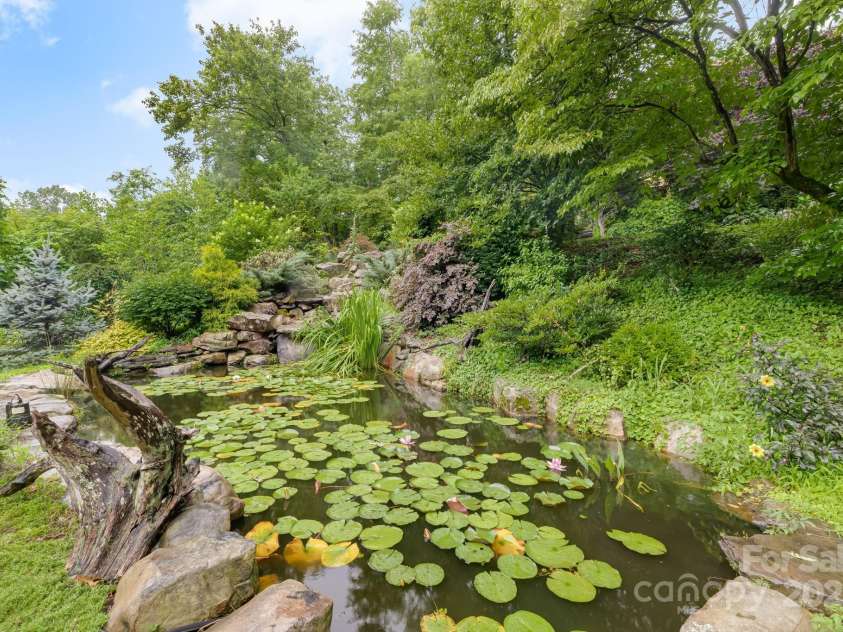 465 Youngs Gap Road, Fletcher, NC 28732.  MLS# CAR4275186, YatesRealty ID 26162. Pond