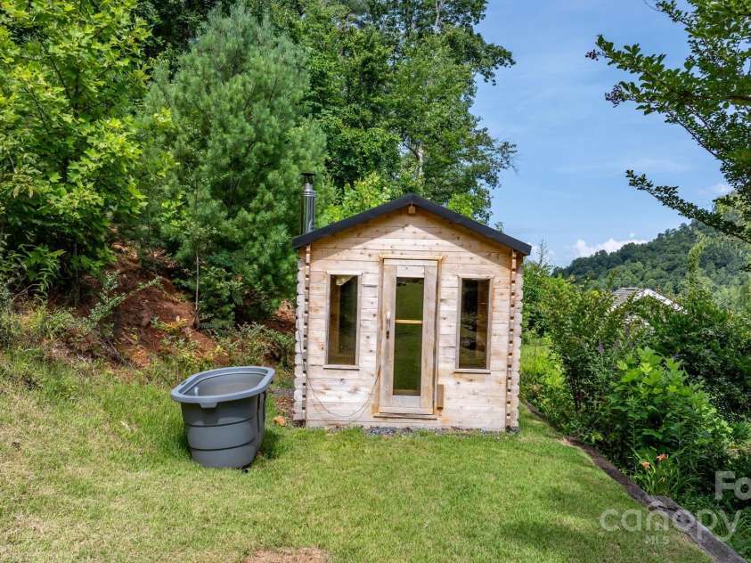 256 Nahum Road, Moravian Falls, NC 28654.  MLS# CAR4275145, YatesRealty ID 26163. White Cedar /European style Firewood dry sauna