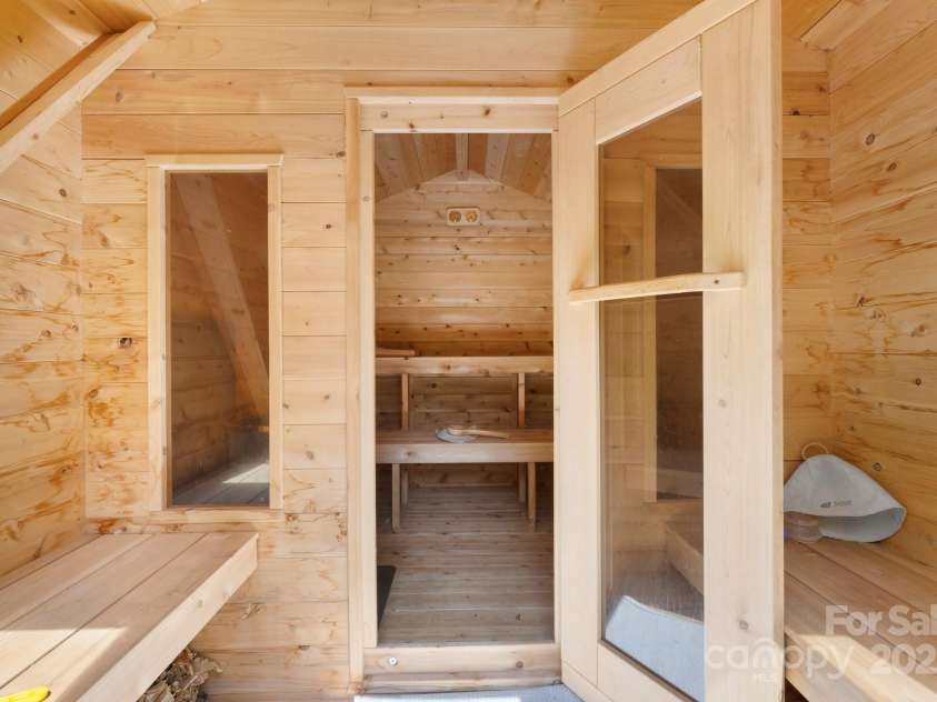 256 Nahum Road, Moravian Falls, NC 28654.  MLS# CAR4275145, YatesRealty ID 26163. White Cedar /European style Firewood dry sauna