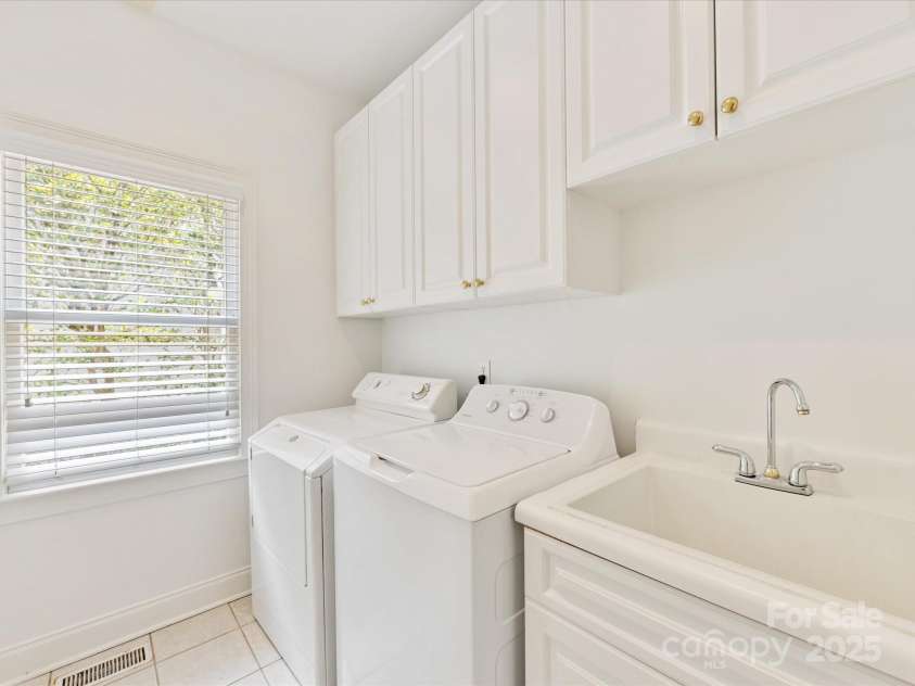 1420 Sterling Road, Charlotte, NC 28209.  MLS# CAR4251543, YatesRealty ID 26166. Laundry Room with utility sink