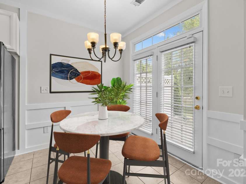 104 Clydesdale Court, Matthews, NC 28104.  MLS# CAR4252630, YatesRealty ID 26167. Dining Area Virtually Staged