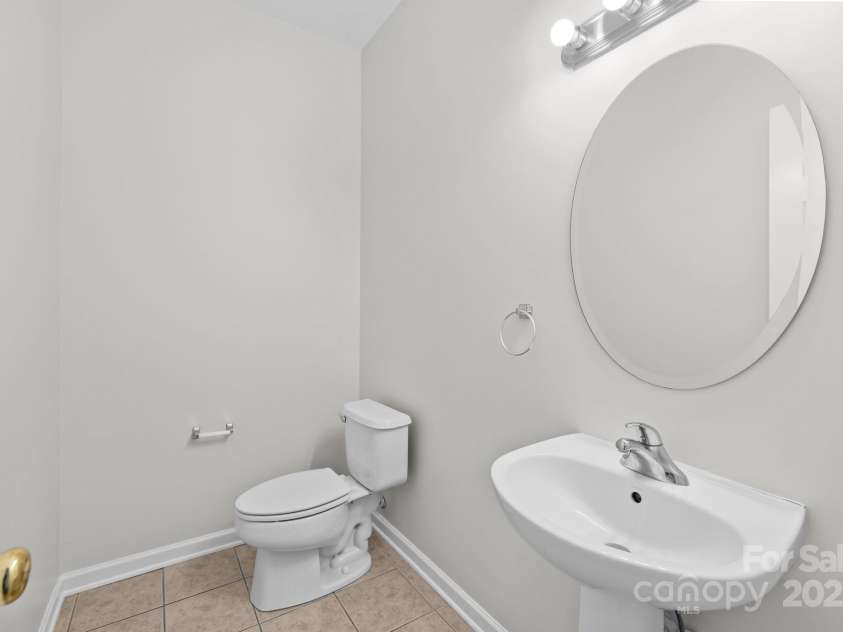 104 Clydesdale Court, Matthews, NC 28104.  MLS# CAR4252630, YatesRealty ID 26167. Powder Room