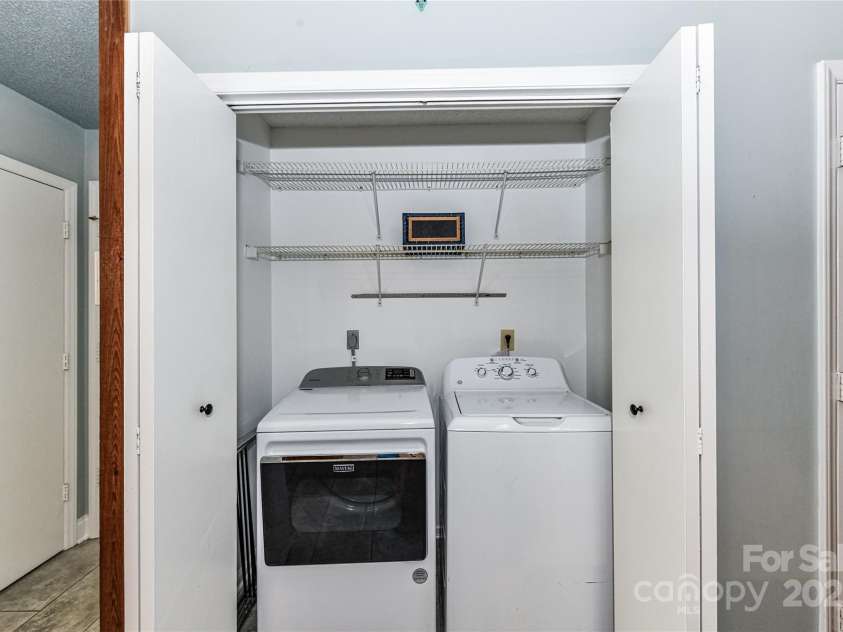 10213 Conistan Place, Cornelius, NC 28031.  MLS# CAR4223056, YatesRealty ID 26169. Convenient Laundry closet