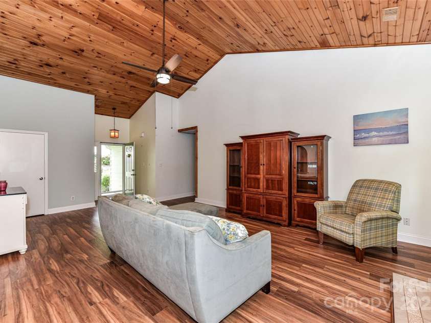 10213 Conistan Place, Cornelius, NC 28031.  MLS# CAR4223056, YatesRealty ID 26169. Gorgeous wood plank ceilings and LVP floors welcome you