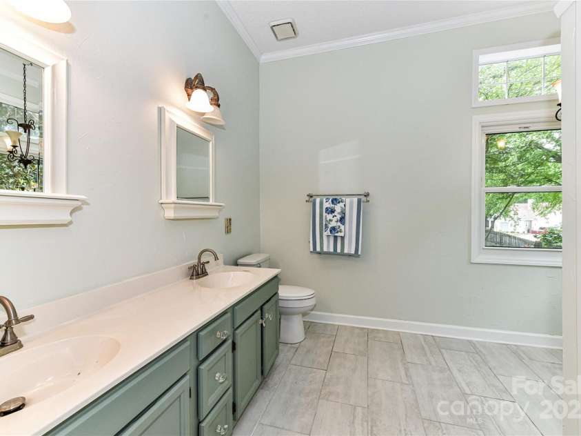 10213 Conistan Place, Cornelius, NC 28031.  MLS# CAR4223056, YatesRealty ID 26169. Spacious en-suite Primary Bathroom with double sinks