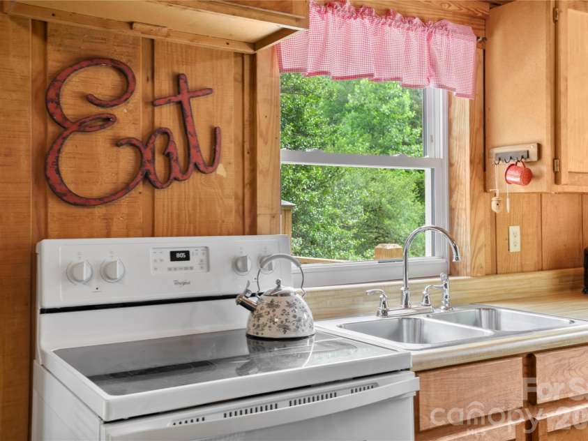 645 Fork Creek Road, Saluda, NC 28773.  MLS# CAR4398267, YatesRealty ID 26169. 