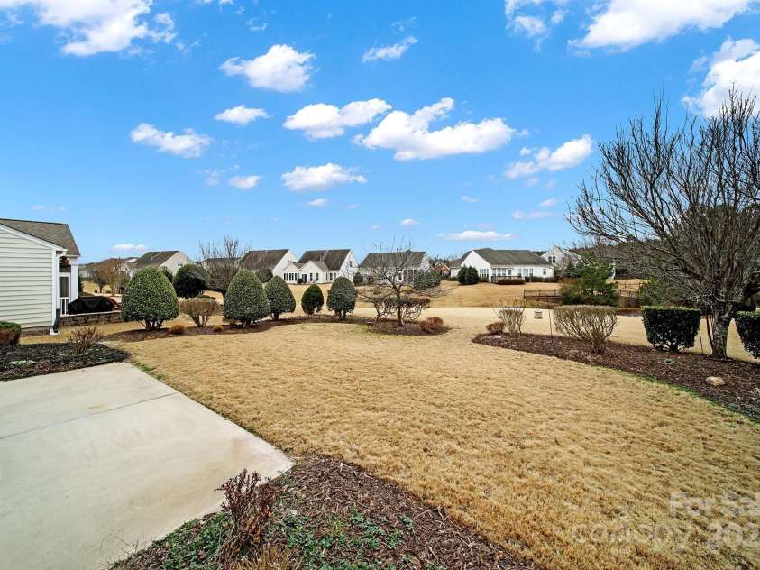 7203 Shenandoah Drive, Fort Mill, SC 29707.  MLS# CAR4221538, YatesRealty ID 2617. Back patio view