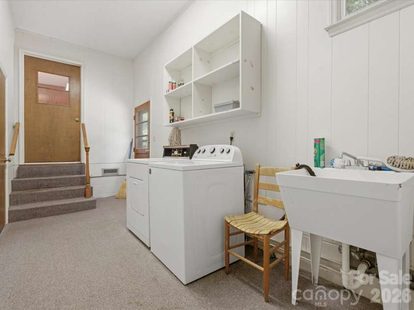 351 Highway 200 Highway, Stanfield, NC 28163.  MLS# CAR4380094, YatesRealty ID 26171. Mudd Room off from attached garage has utility sink and toilet this is counted as a half bath on main level. Seller makes no representation to any of the appliances, or sinks, toilets, showers in all bathrooms- the