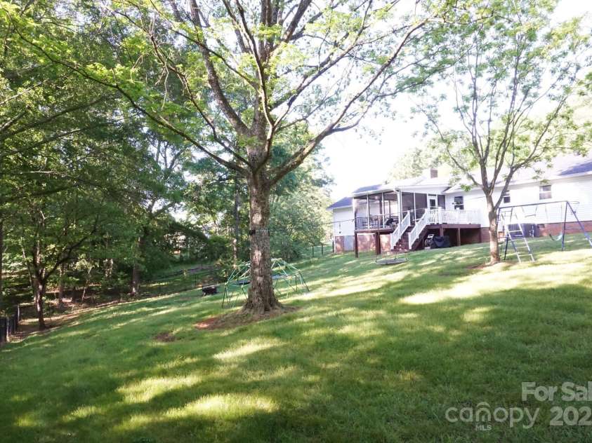 854 Silver Fox Drive, Concord, NC 28025.  MLS# CAR4251256, YatesRealty ID 26171. A picture can't give you the sound of birds and the absence of noise that is found in this yard. Peaceful.