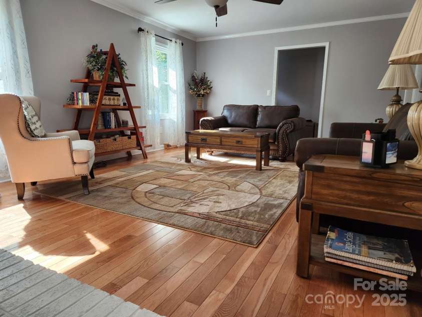 854 Silver Fox Drive, Concord, NC 28025.  MLS# CAR4251256, YatesRealty ID 26171. A view from fireplace looking out.