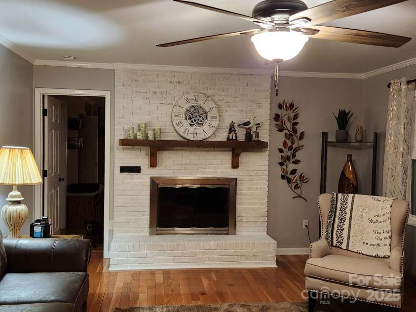 854 Silver Fox Drive, Concord, NC 28025.  MLS# CAR4251256, YatesRealty ID 26171. Familyroom with beautiful hardwood floors.