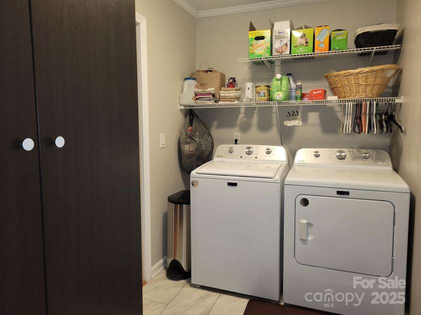 854 Silver Fox Drive, Concord, NC 28025.  MLS# CAR4251256, YatesRealty ID 26171. Laundry and pantry room.